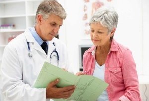 Woman with arthritis at the doctor's appointment